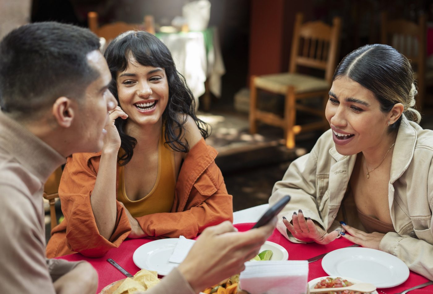 people-enjoying-mexican-food-dinner